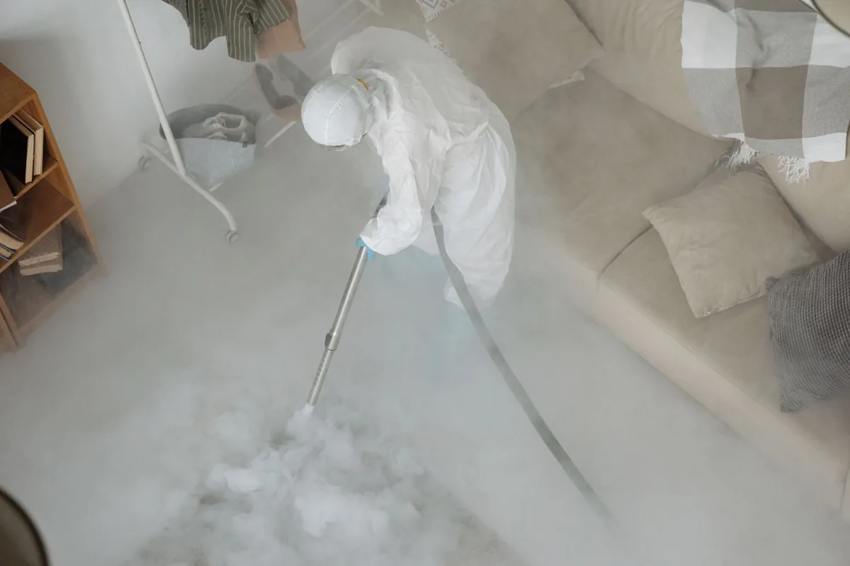 Biohazard cleanup technician in protective equipment, Thirteenth St Heights, St. Petersburg, FL